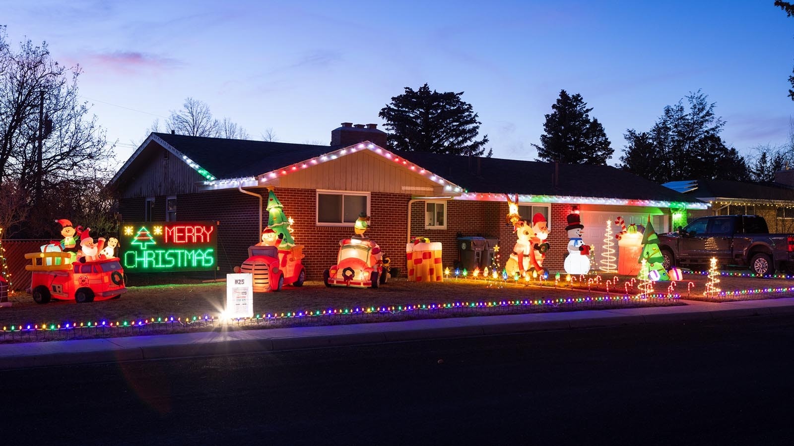 Brian Bartow’s fire truck Christmas light display on Dec. 19, 2024, at 550 Essex Road in Cheyenne, Wyoming.