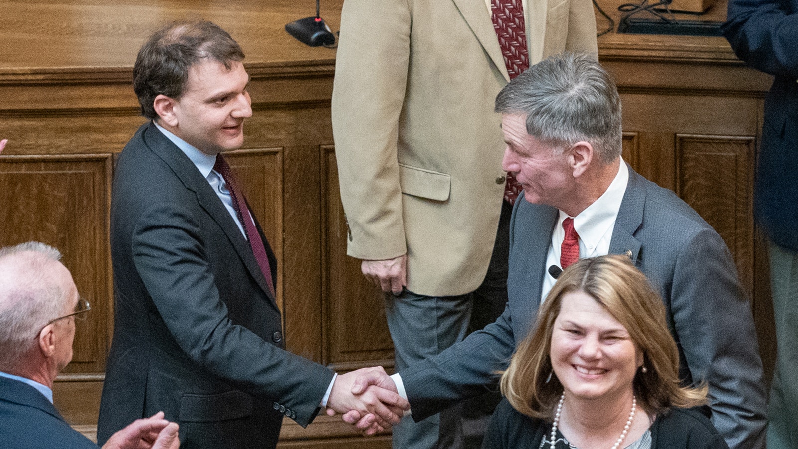 Secretary of State Chuck Gray, left, shakes hands with Gov. Mark Gordon at the beginning of the 2024 Wyoming legislative session at the Capitol in Cheyenne.