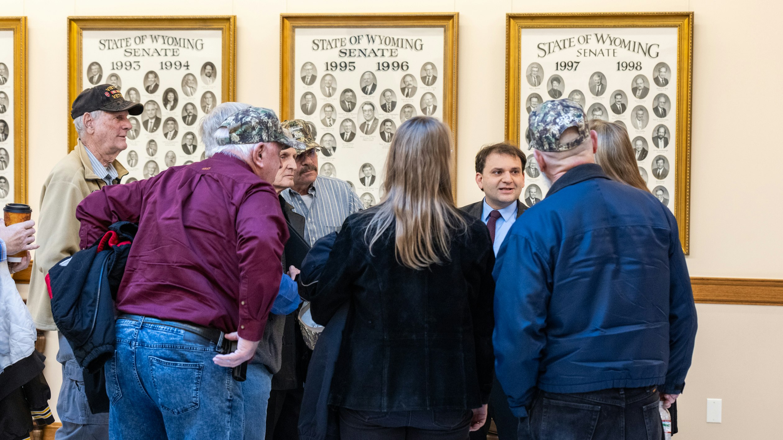 Secretary of State Chuck Gray talks with people in the hall at the Wyoming Capitol on Wednesday, Feb. 19, 2025. Gray is a big supporter of election reform, including banning ballot drop boxes.