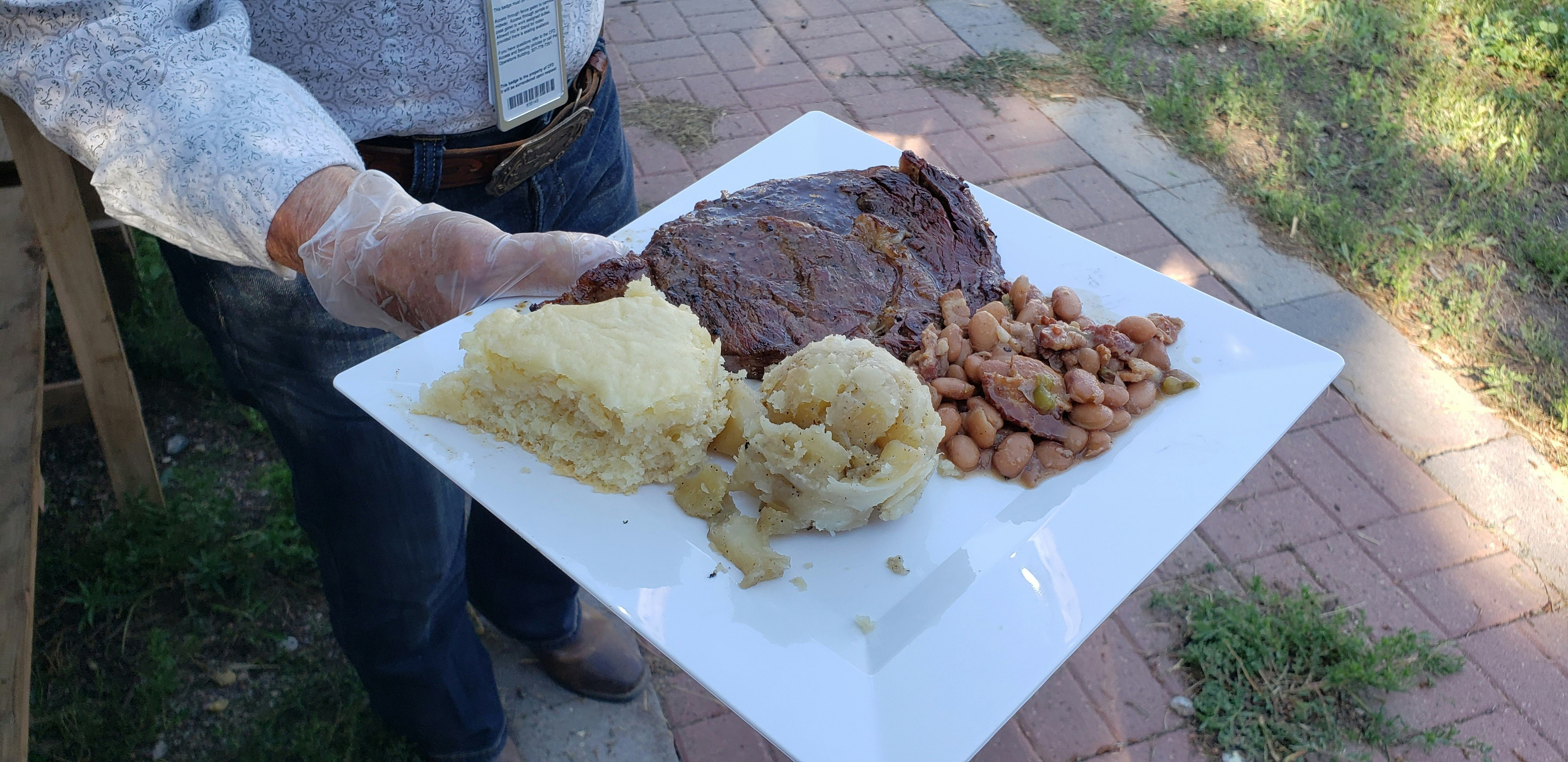 Ribeye, mashed potatoes, sourdough biscuits and beans all cooked over an open campfire, on the grill or in a Dutch oven..