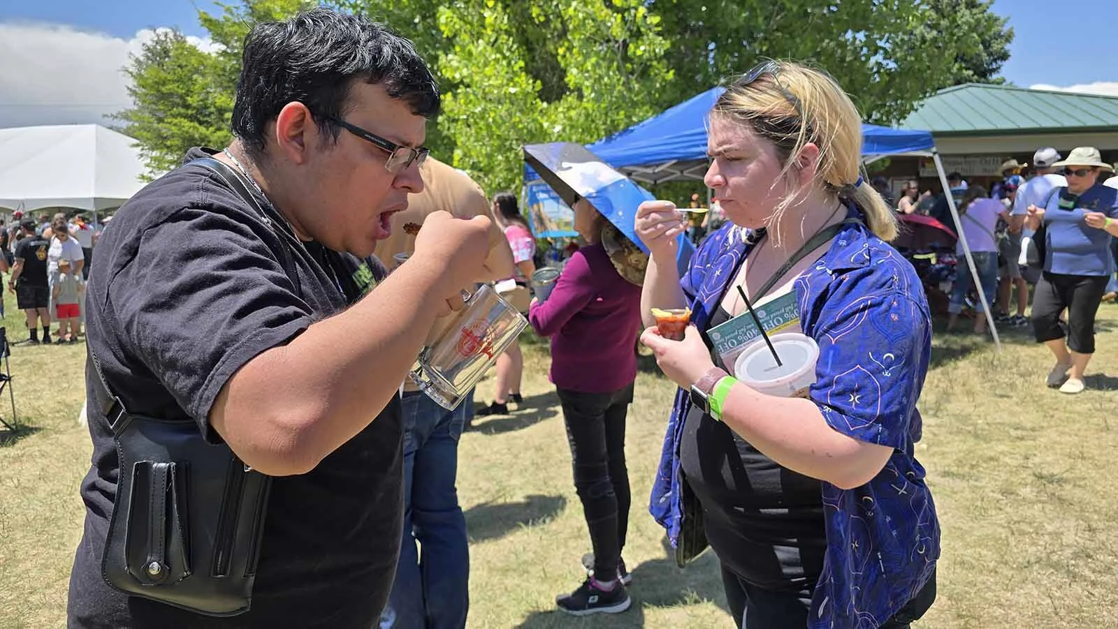 Brian Munoz, left, and his girlfriend, Kimberly Dossier taste one of the chilis entered in the 40th annual Chugwater Chili Cook-off held on Father's Day weekend.