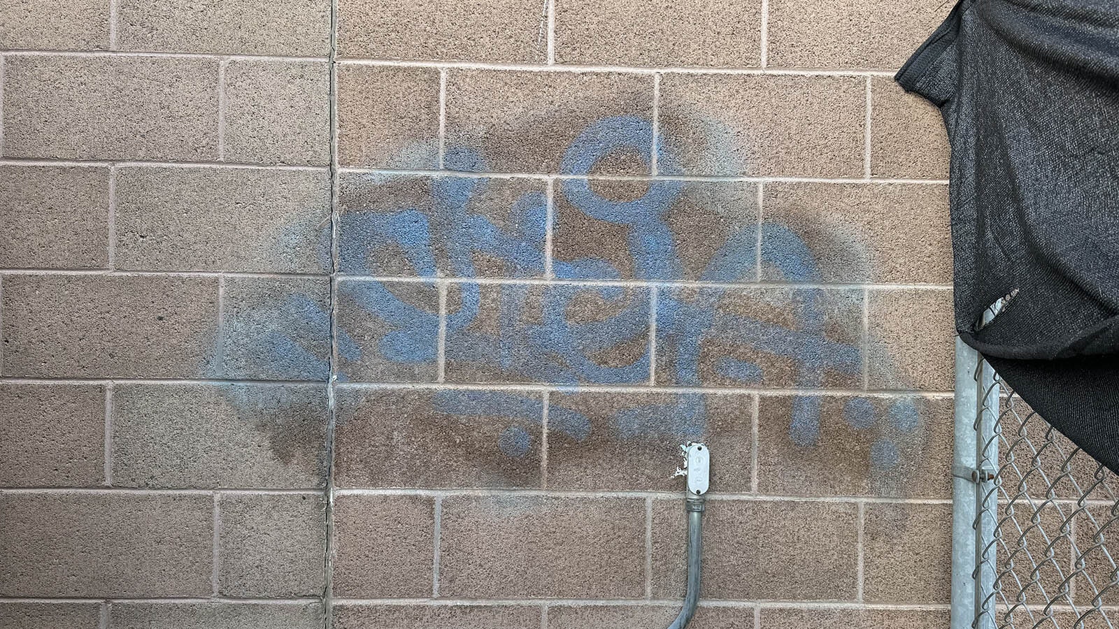 Police say a Wyoming resident has been spray-painting public and private properties across the country for a decade. 