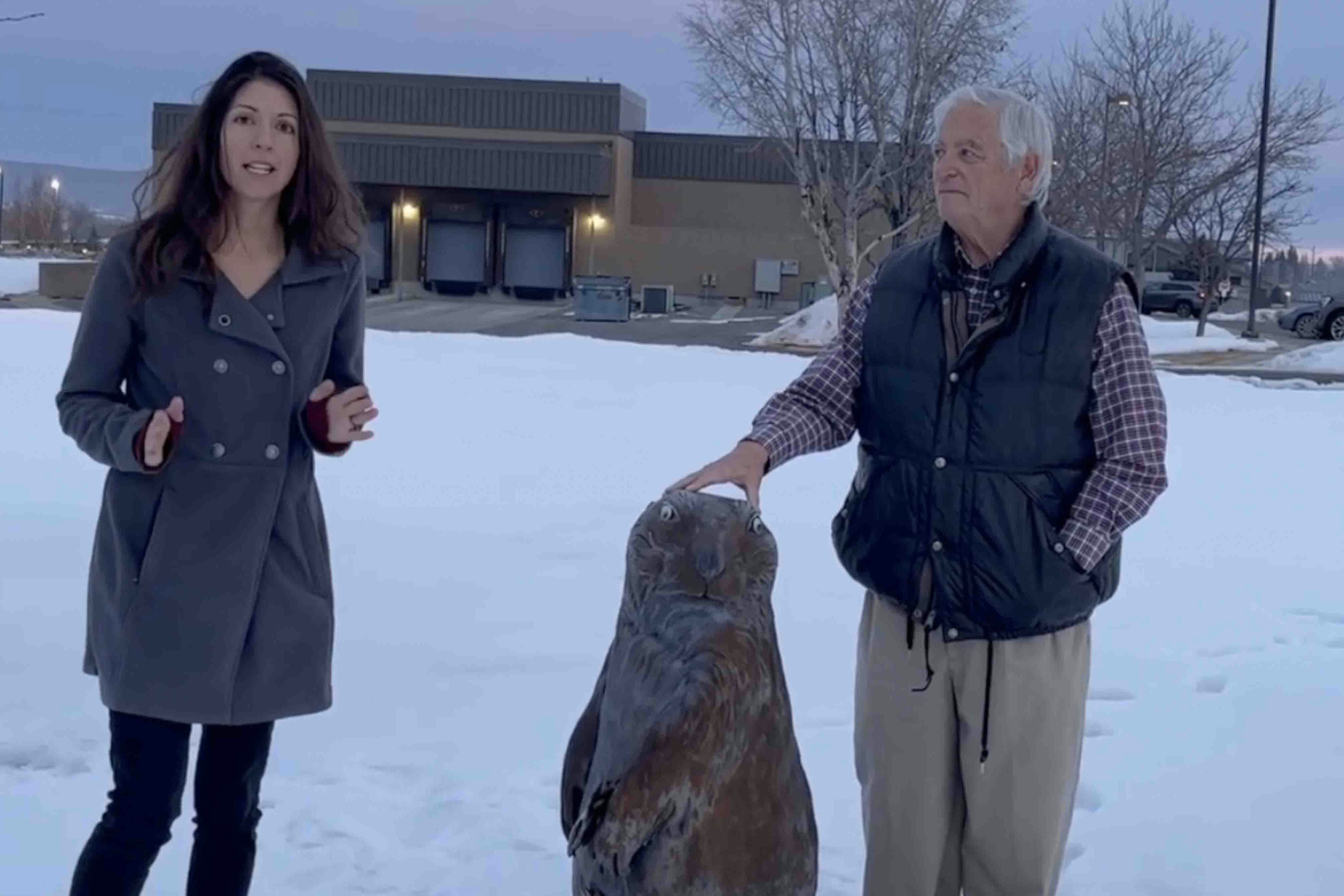Cowboy State Daily reporter Clair McFarland and columnist Bill Sniffin with Lander Lil early Friday morning to witness of Wyoming's most famous prairie dog would see her shadow. She didn't.