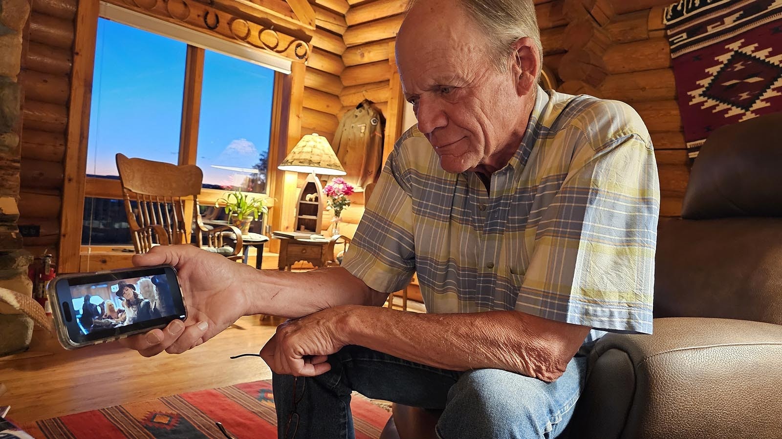 Clay Gibbons watches a music video by Kiesza at his ranch between Worland and Thermopolis. The video includes a poem he wrote in college for a classroom assignment. He was 23 when he wrote the poem.