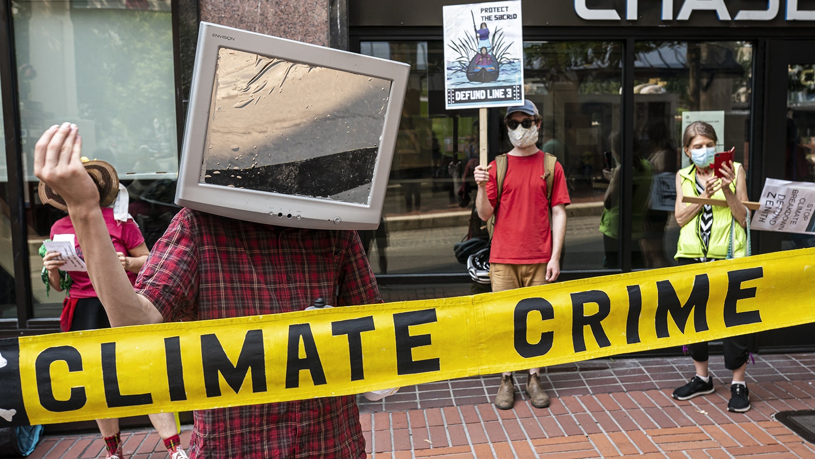 Climate Change protesters hold a rally during an extreme heatwave on Aug. 13, 2021, in Portland, Oregon. As temperatures climb across the nation, nearly 200 million Americans are under some level of heat advisory.