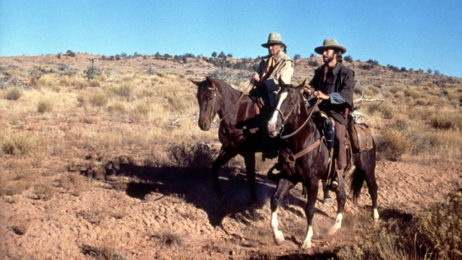 Canadian actor Chief Dan George, chief of the Tsleil-Waututh Nation, with director Clint Eastwood on the set of his movie "The Outlaw Josey Wales," based on the book by Forrest Carter.