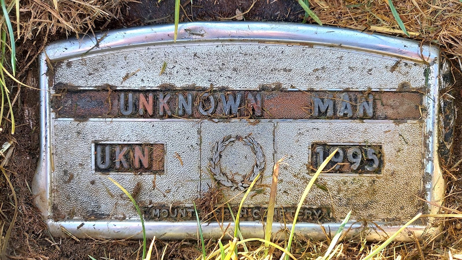 The cremains of "Coal Train Carlos" are buried under the marker "Unknown Man" in Mount Pisgah Cemetery in Gillette, Wyoming.