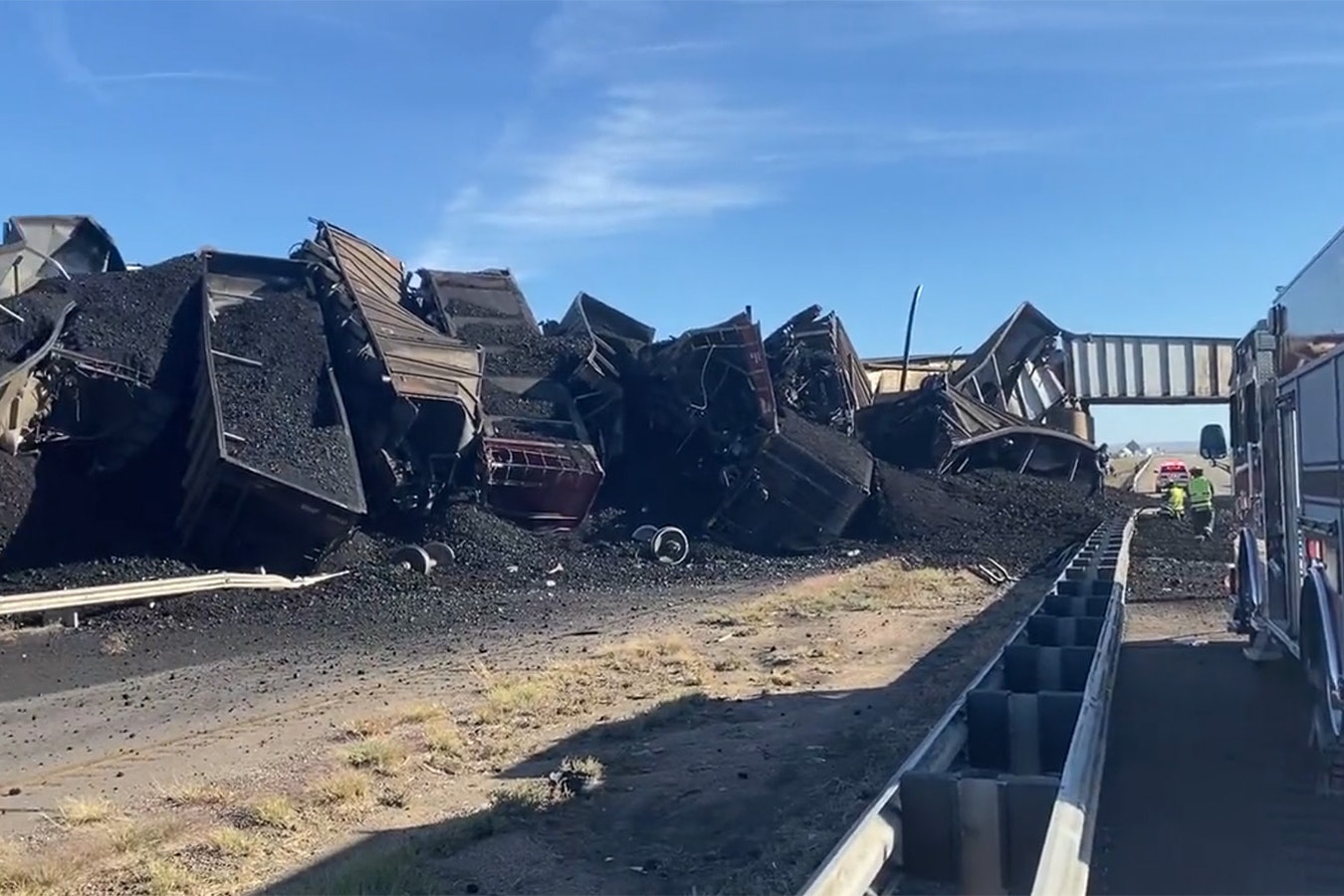 A train loaded with coal from Wyoming's Powder River Basin crashed Sunday afternoon near Pueblo, Colorado, when a track on bridge over Interstate 25 failed, causing the train to derail and bridge to collapse.