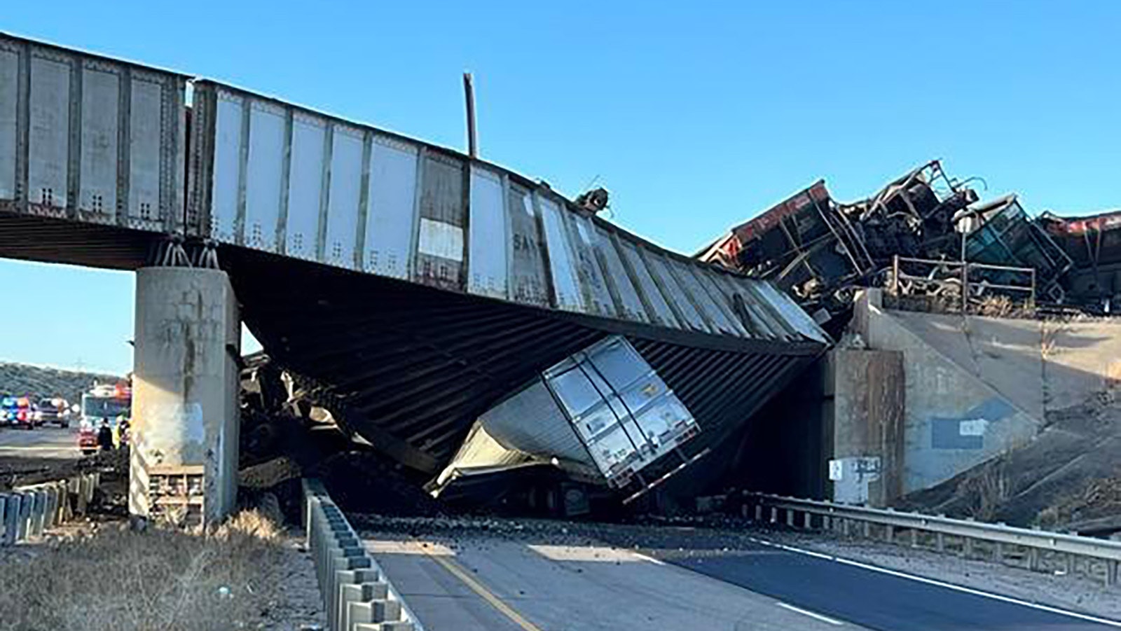The 60-year-old driver of a semitrailer was killed with this bridge collapsed on it when a loaded coal trail derailed over Interstate 25 on Sunday afternoon north of Pueblo, Colorado.