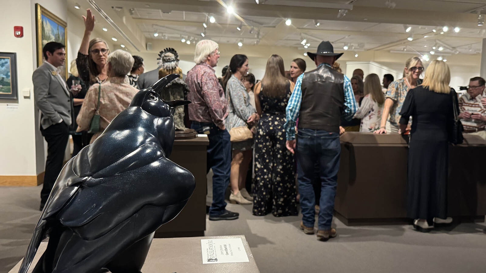 "Caw of the Wild," a bronze sculpture by Jeremy Bradshaw, in the gallery of the 43rd Buffalo Bill Art Show and Sale.