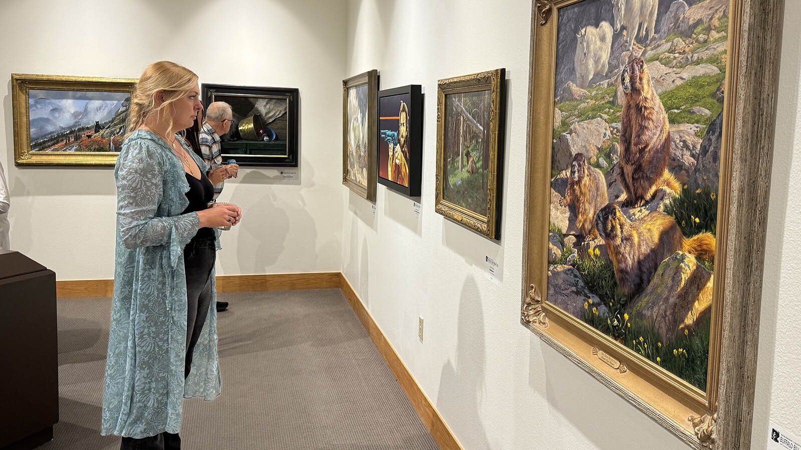 Patrons at the opening reception of the 43rd Buffalo Bill Art Show and Sale at the Buffalo Bill Center of the West in Cody.