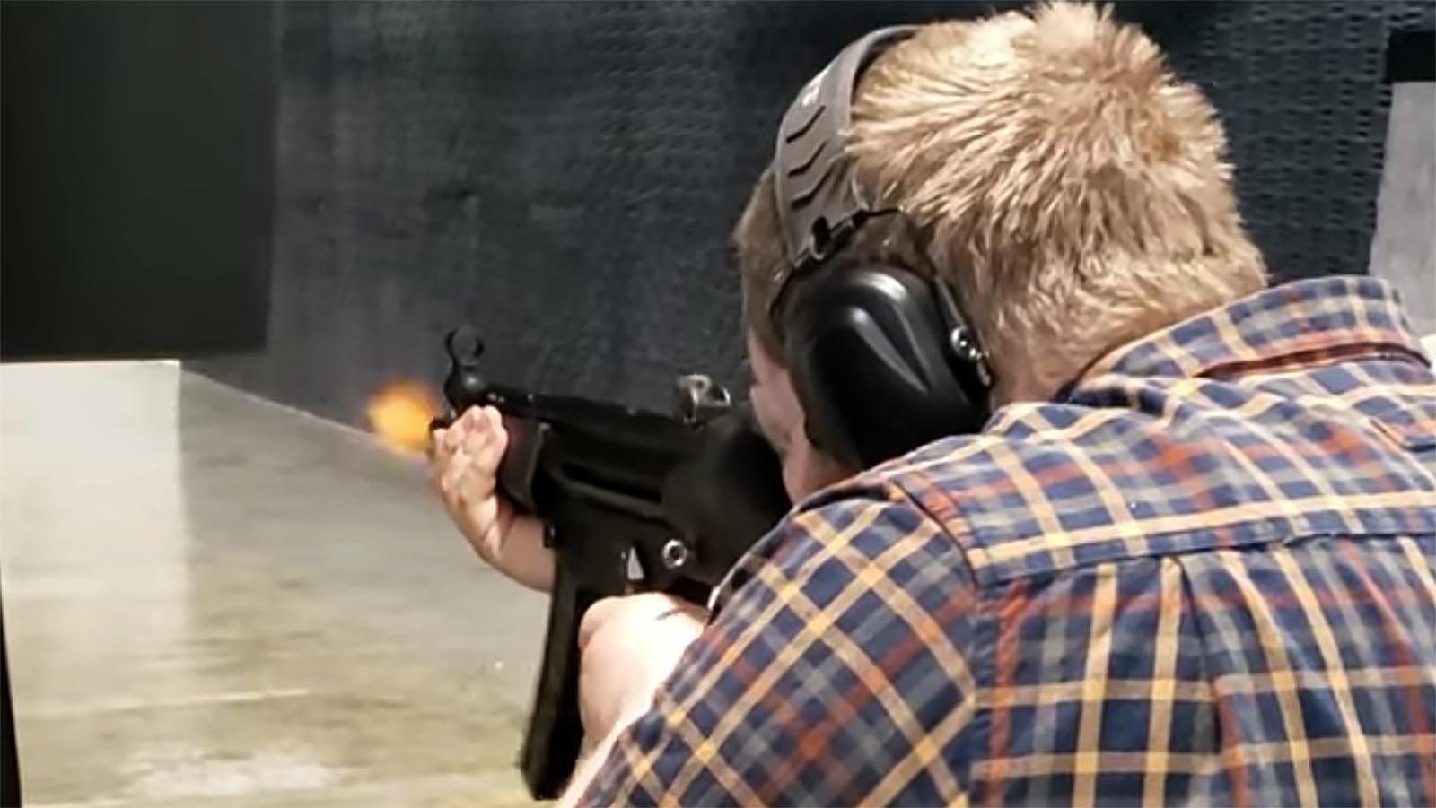 To get customers into the holiday spirit, the Cody Firearms experience is offering a chance to fire a Beretta 92 semiautomatic pistol and a Heckler & Koch MP5 submachine gun. Those were the hero’s weapons of choice in the 1988 action flick “Die Hard” — which many insist is a Christmas movie. Here, a customer fires an MP5.