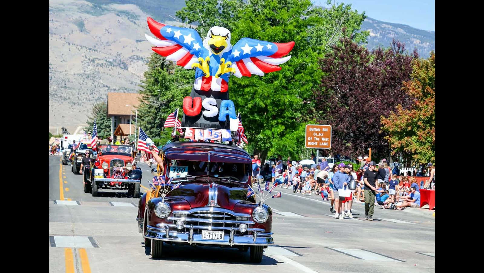 A 1948 Pontiac Silver Streak station wagon and "Engine 00" of the Cody Volunteer Fire Department in the 2026 Cody Stampede Parade.