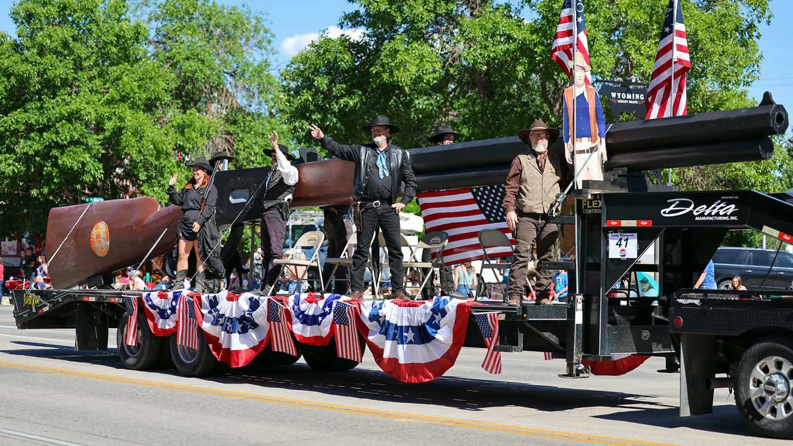 The Cody Gunslingers with a 40-foot-long replica of a 1968 Winchester 94 Buffalo Bill .30-30 rifle in the 2026 Cody Stampede Parade. The rifle was originally built for America's bicentennial celebration in 1976 and fully restored for its return to the parade. 