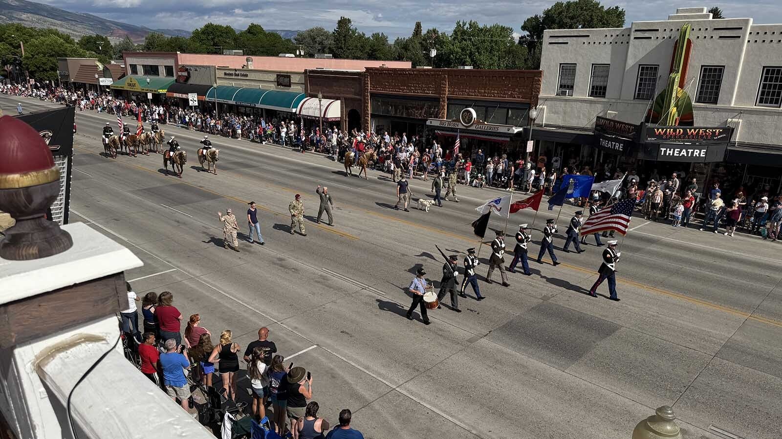 The Cody Stampede Parade as seen from the second floor balcony of the Irma Hotel.