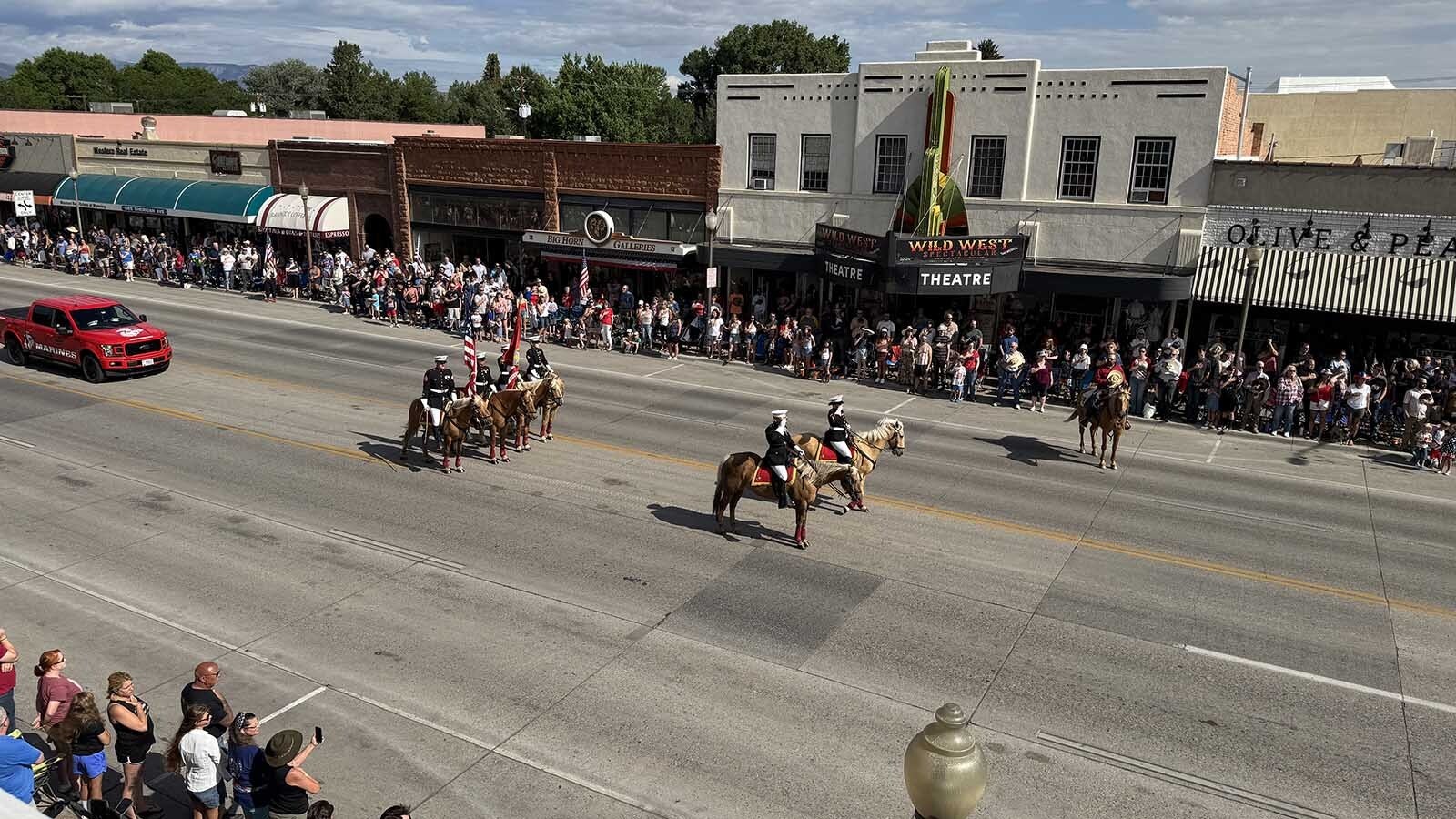 The Cody Stampede Parade as seen from the second floor balcony of the Irma Hotel.