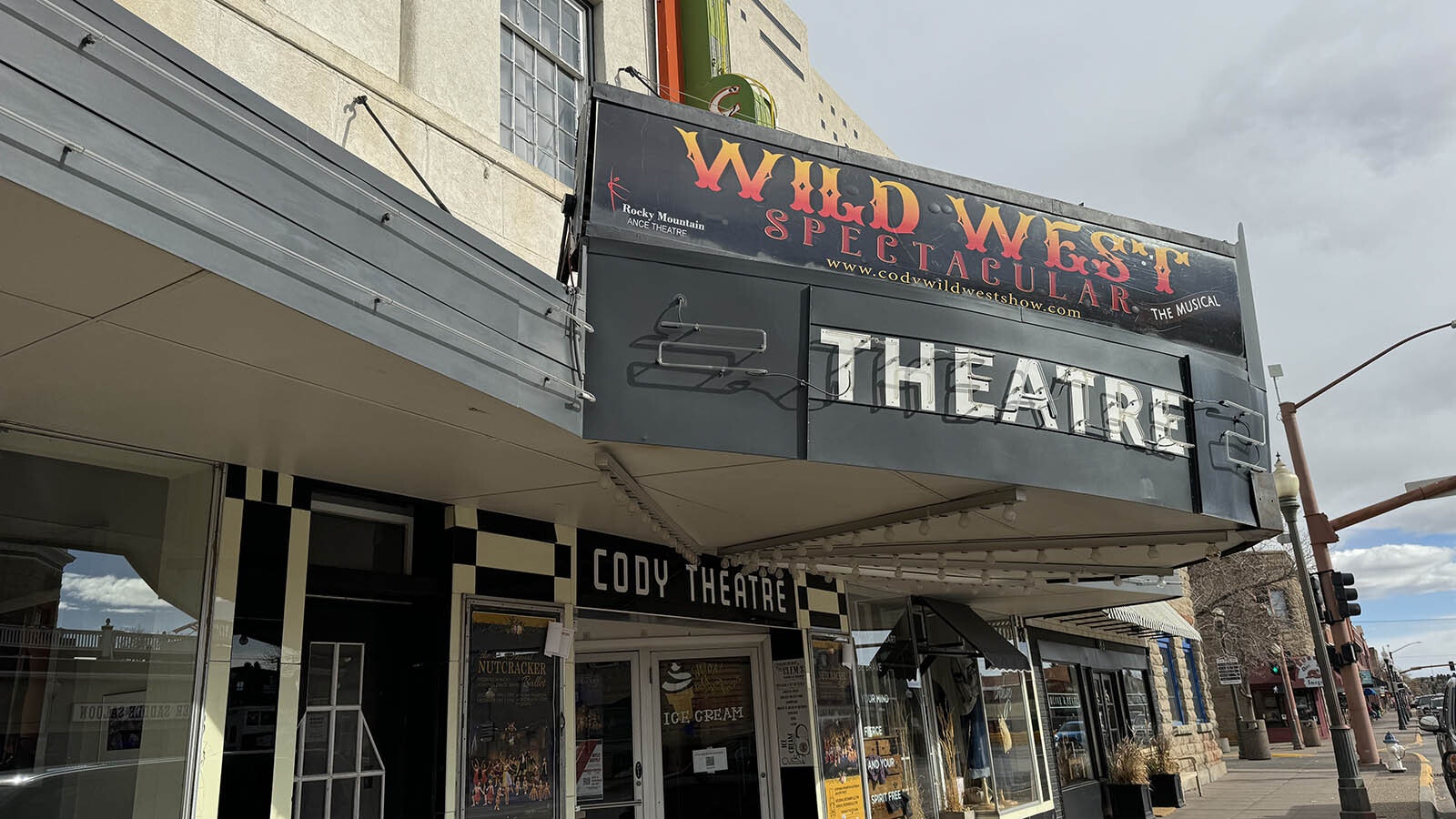 The marquee on the historic Cody Theatre would fall off the face of the building if it weren't wired on. It needs some serious repair, but needs clearance from the city and state to do it.