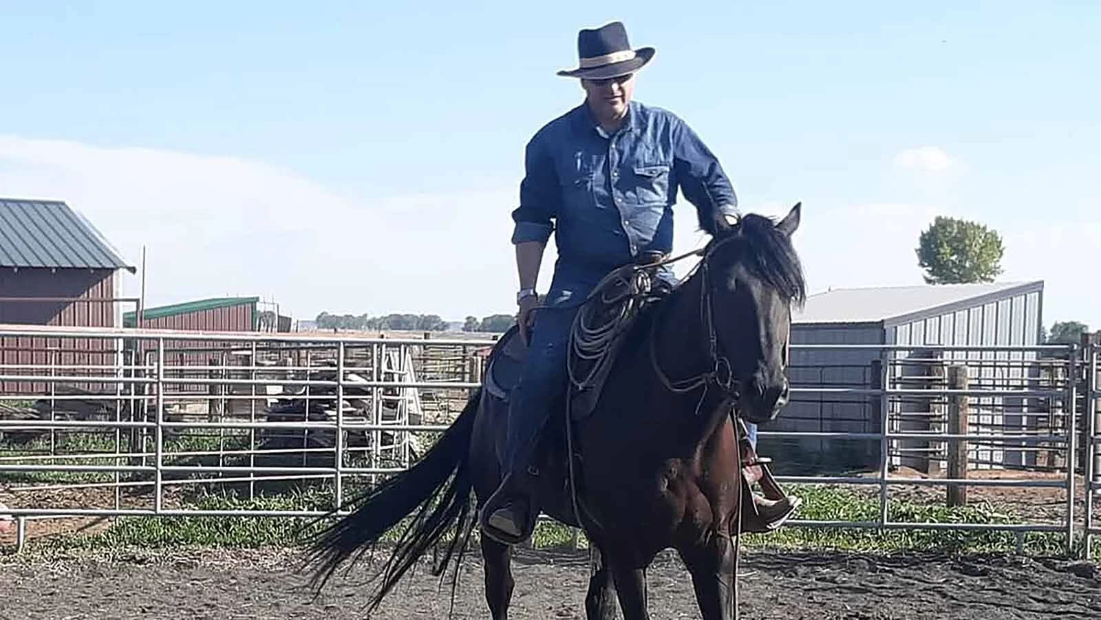 Cody blacksmith NJ Pawley riding a horse.
