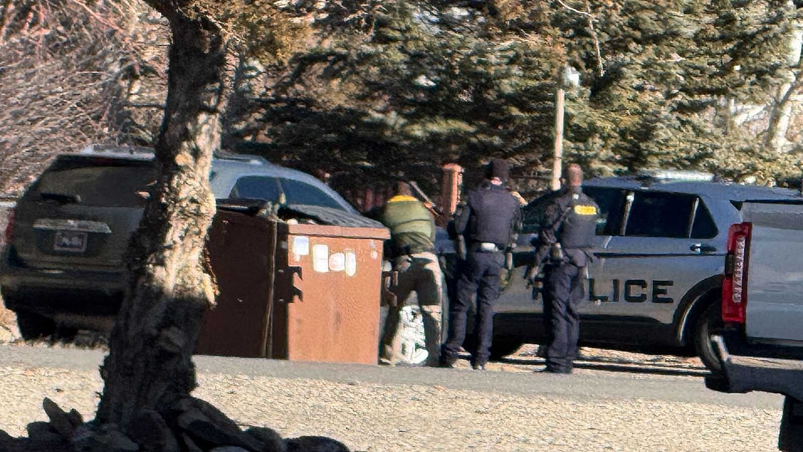 Multiple law enforcement agencies were engaged in an armed standoff with a suspect in a residential area of Cody on Wednesday that included shots being fired. The suspect was told over a loudspeaker to “come out with your hands up."