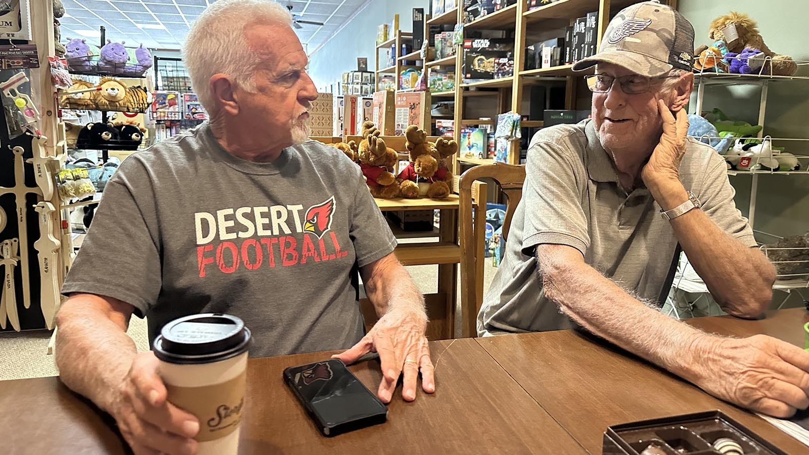 Jerry Deromedi and Lambert Gunk have gotten to know each other over coffee. The men meet every morning at the Storyteller in Thermopolis with a group that have been dubbed “The Table of Knowledge” by owner Ellen Reed.