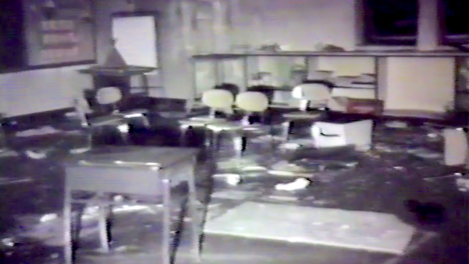 Cokeville bombing classroom scene still from video. Some say the impression on the far way resembles an angel.