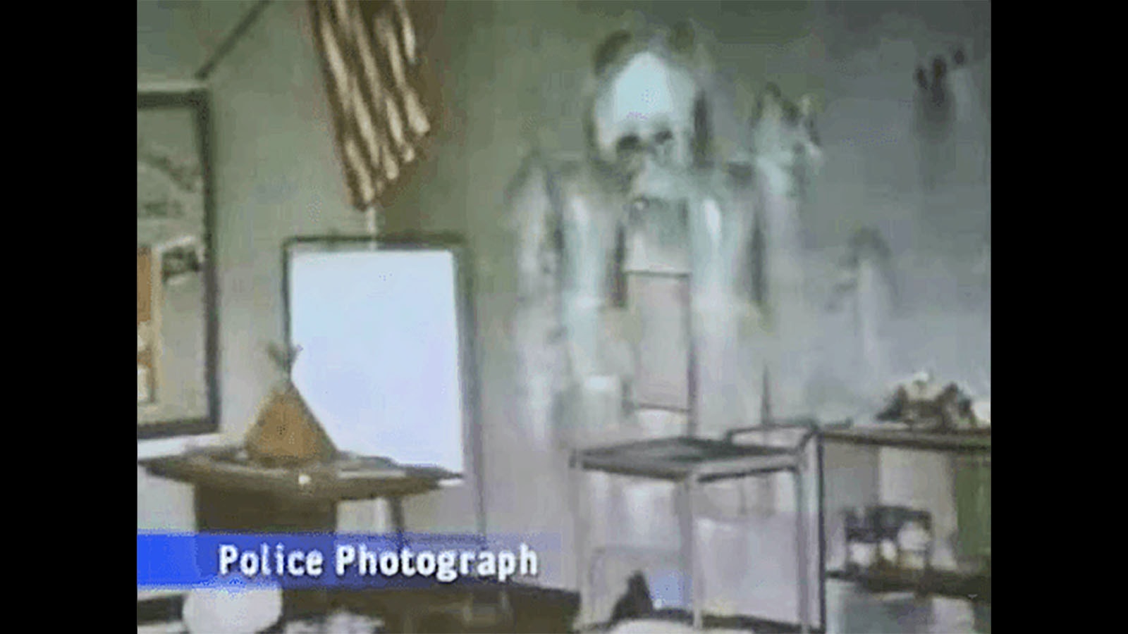 This photograph taken by police in the investigation after the Cokeville Elementary School bombing shows a peculiar outline on the wall. Many of the students reported seeing and being helped by angels during the ordeal and right after the explosion. Some say the outline represents one of those angels.