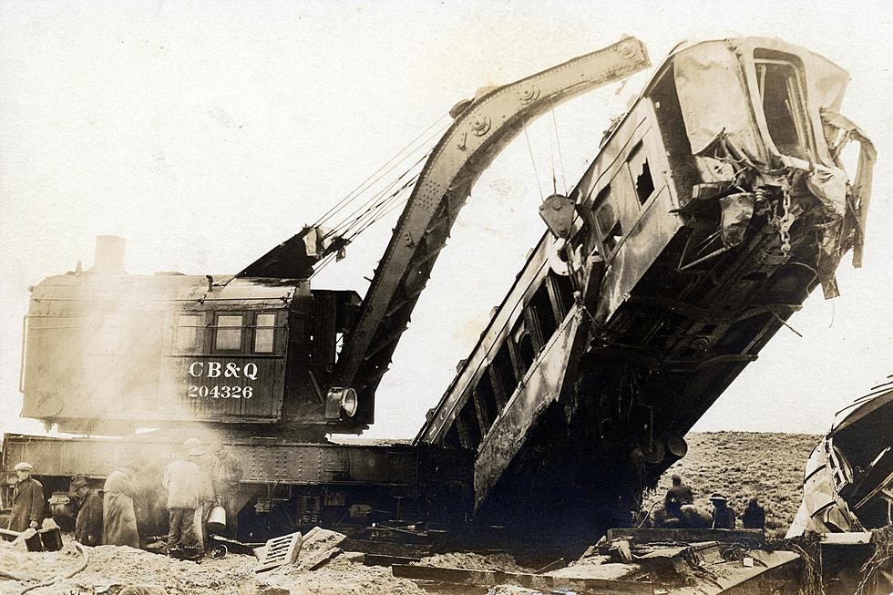 A crane recovers one of the cars that plunged into Cole Creek in September 1923.