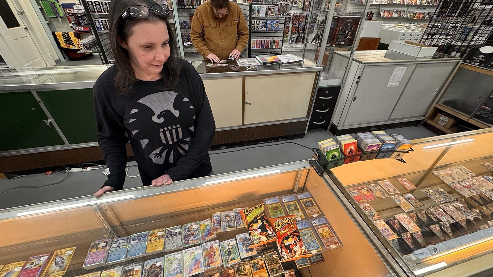 Megan Giatroudakis owns Collector's Hub in downtown Cheyenne. Although she has some pretty pricey Pokémon cards — including one for $400 — they don't hold a candle to the Charizard Cheeto that sold for $88,000 Sunday.