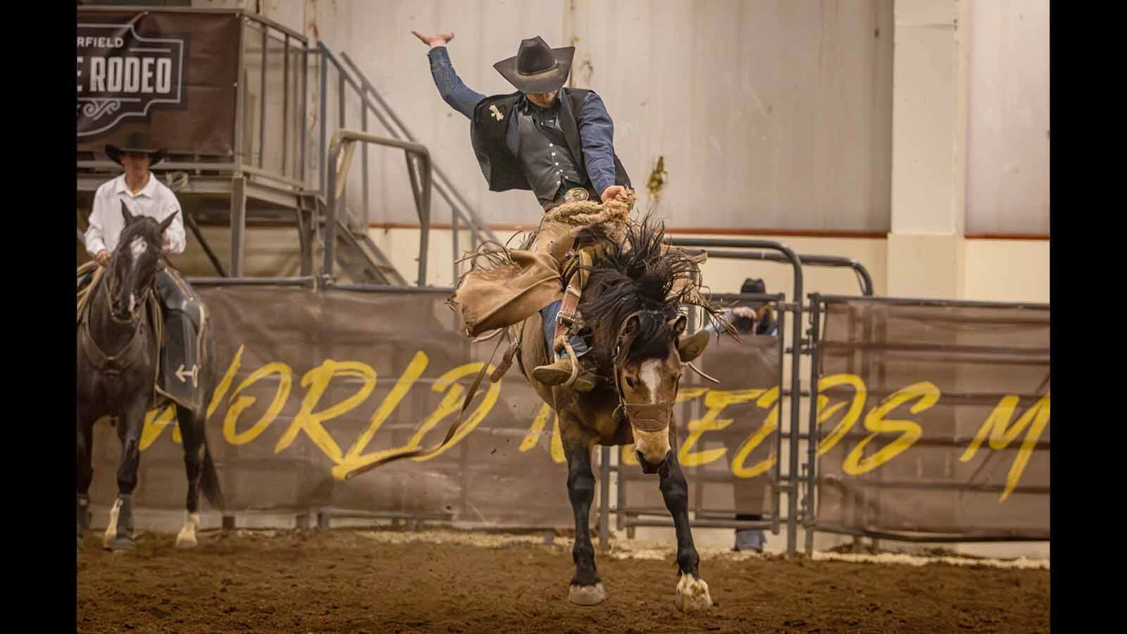 Sheridan College junior Jake Schlattmann rides in Laramie in late April during the final rodeo of the regular season.