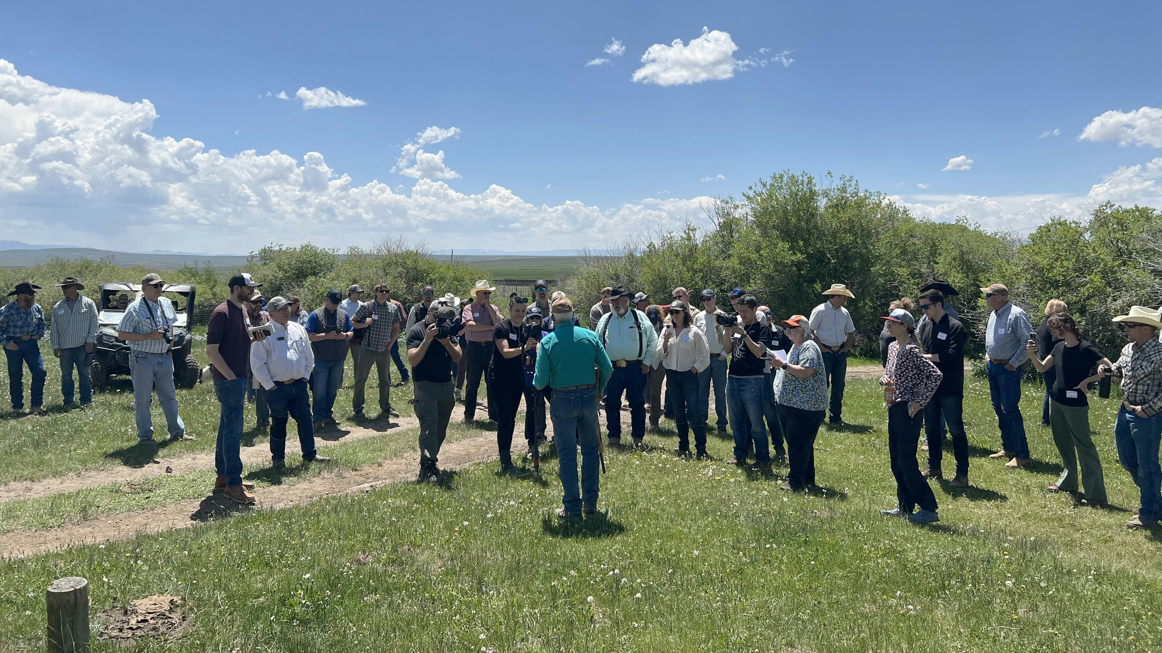 Northern Colorado rancher Don Gittleson speaks to people gathered Saturday at the ranch his family leases near the Wyoming state line.
