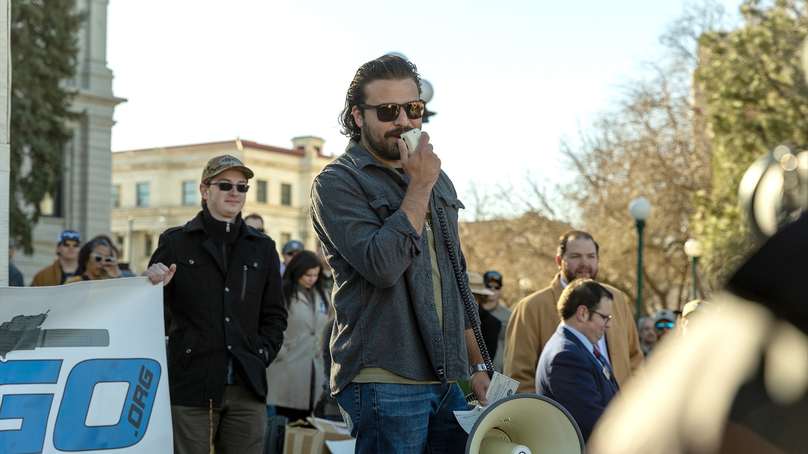 YouTube gun channel celebrity Brandon Herrera speaks Tuesday morning in front of the Colorado Capitol building at a rally protesting a proposed “assault weapons ban” bill.