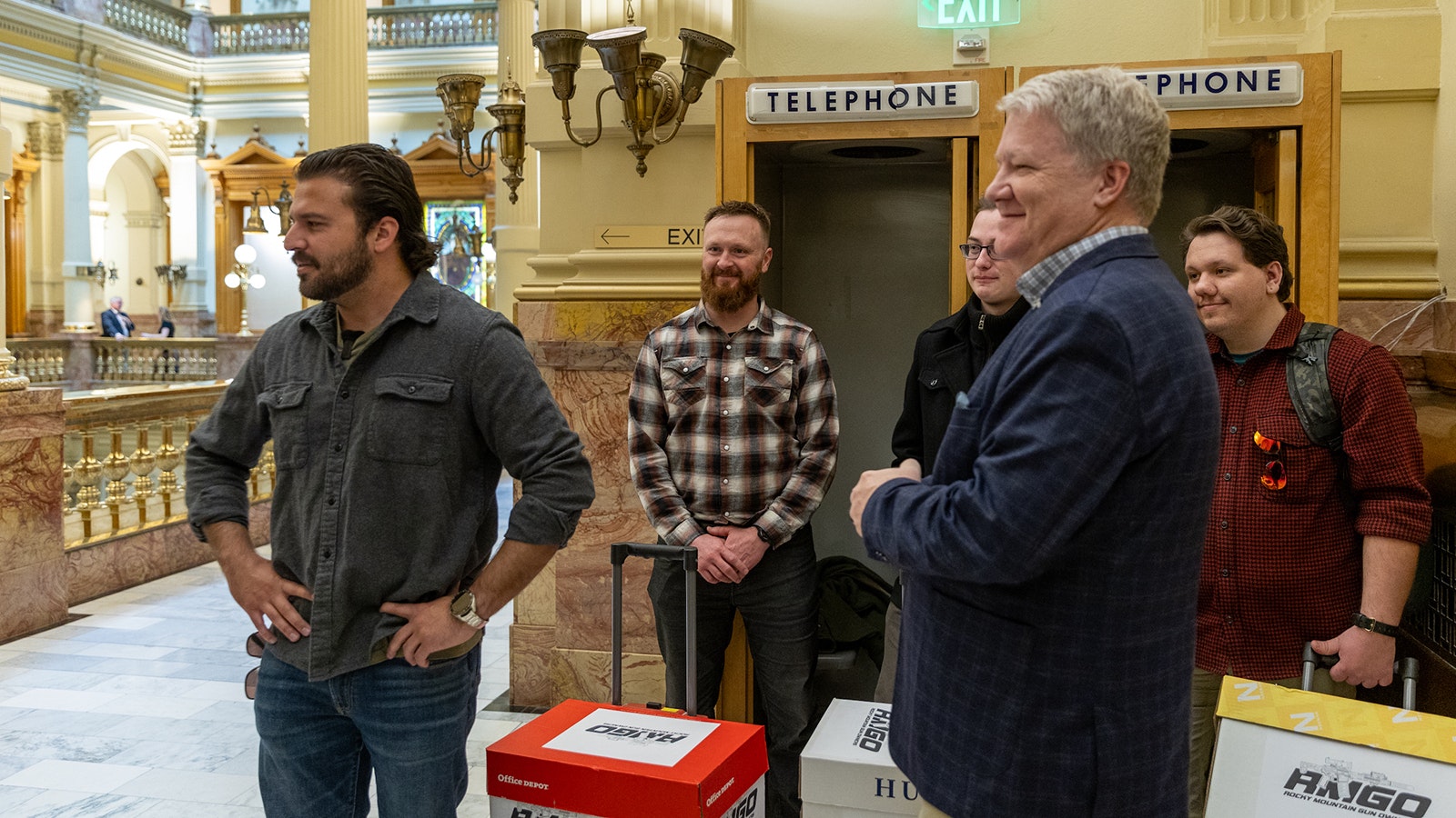 Gun rights advocates prepare to deliver thousands of petitions protesting an “assault weapons ban” bill in the Colorado state Capitol early Tuesday.