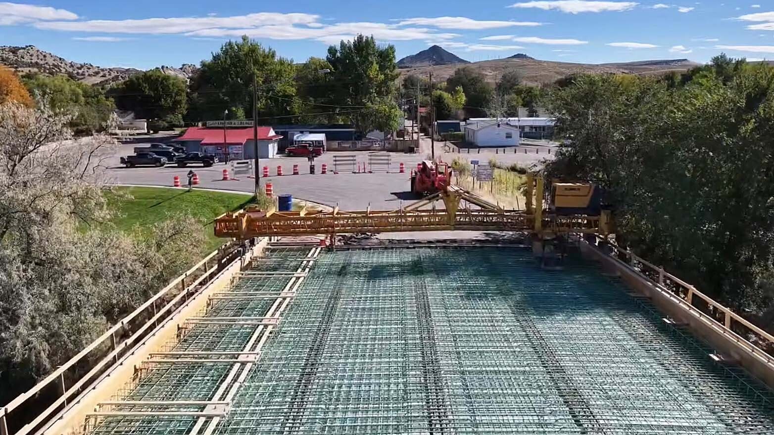 The Broadway Bridge spanning the Bighorn River in Thermopolis has been closed since July as it gets a major upgrade. On Thursday, crews from Canyon Concrete did a huge single pour of about 1.2 million pounds of concrete to cover it.