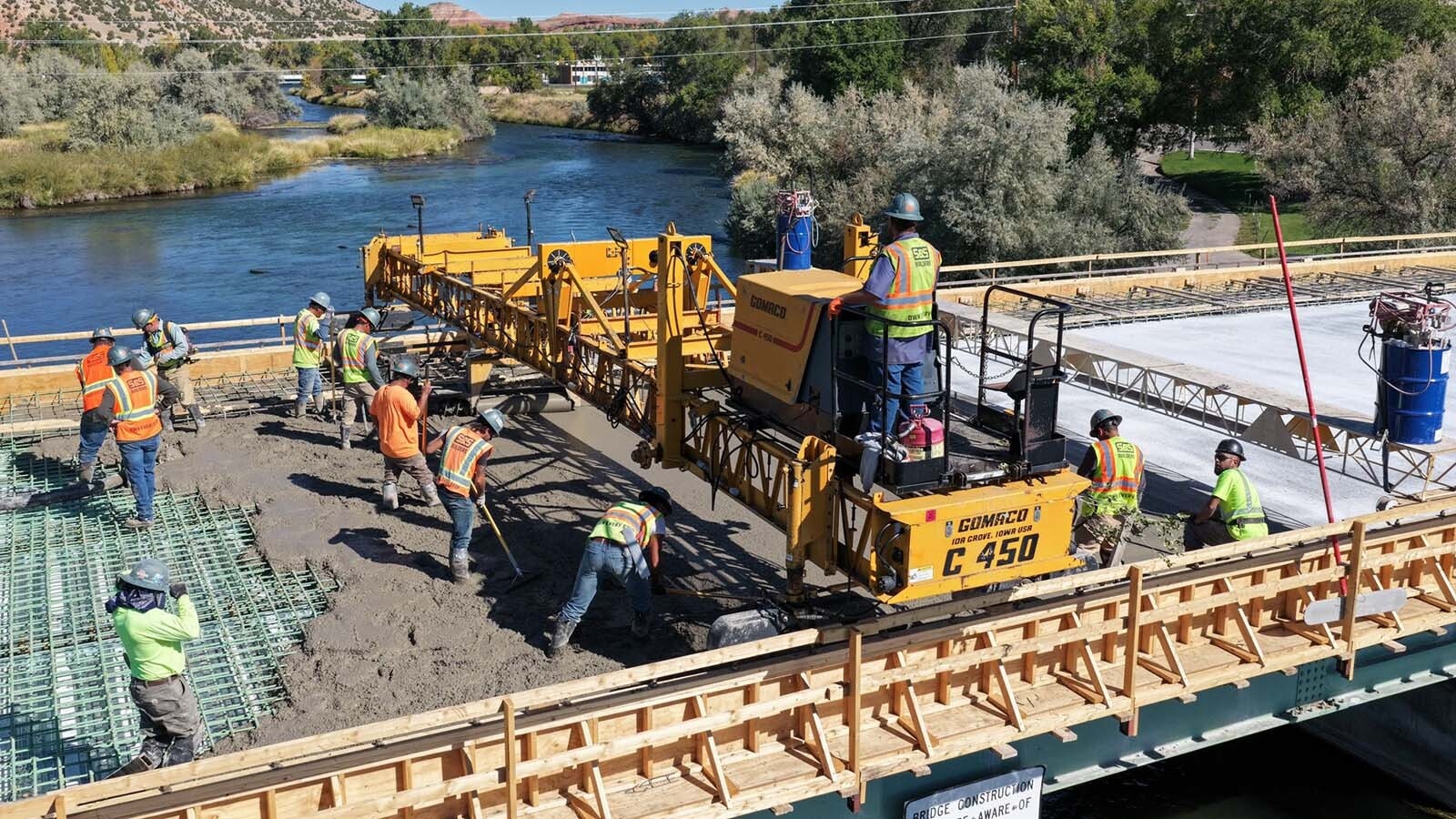 The Broadway Bridge spanning the Bighorn River in Thermopolis has been closed since July as it gets a major upgrade. On Thursday, crews from Canyon Concrete did a huge single pour of about 1.2 million pounds of concrete to cover it.