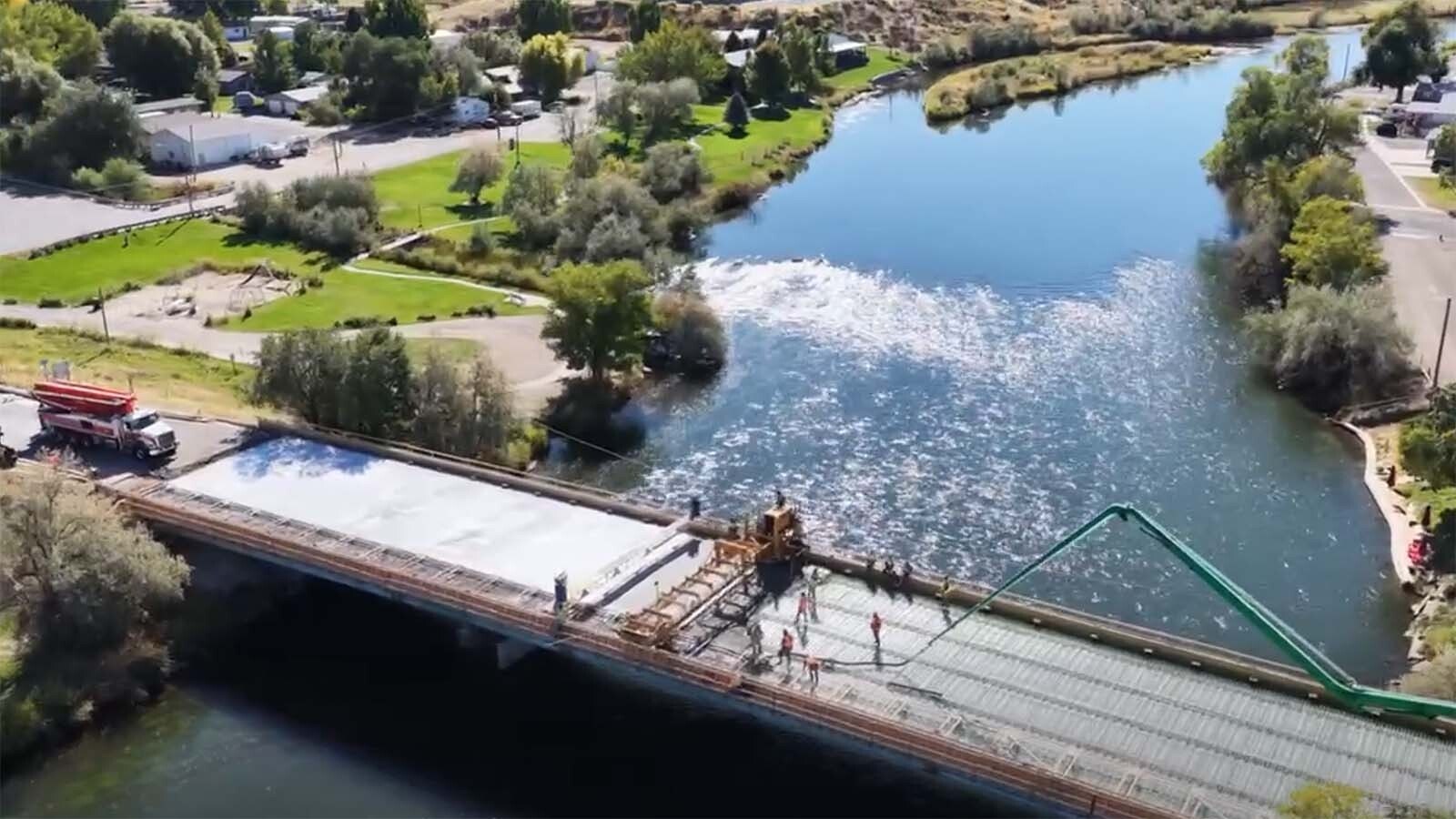 The Broadway Bridge spanning the Bighorn River in Thermopolis has been closed since July as it gets a major upgrade. On Thursday, crews from Canyon Concrete did a huge single pour of about 1.2 million pounds of concrete to cover it.