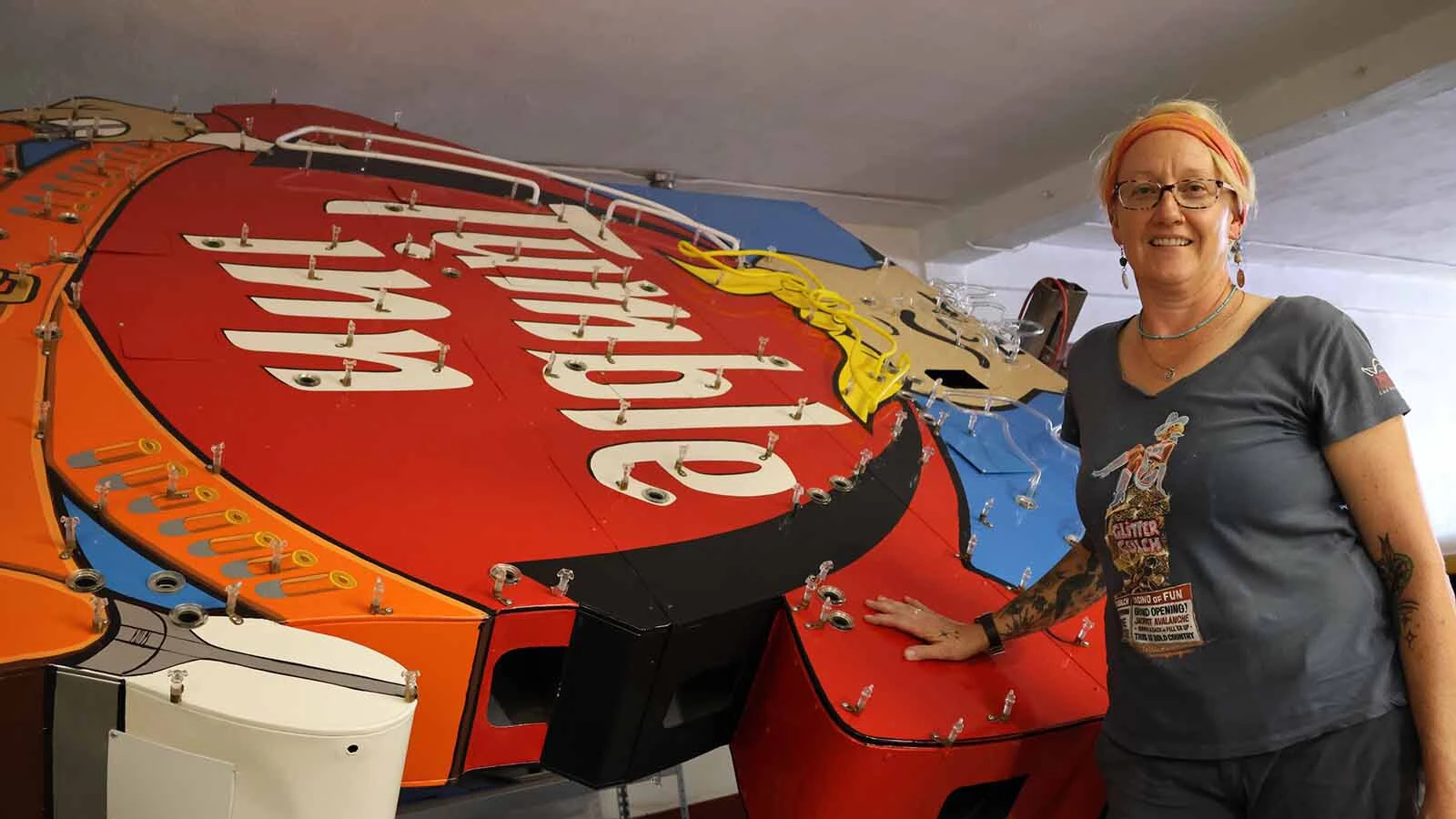 Neon artist Connie Morgan believes she can get the Tumble Inn Cowboy sign completed by next May.