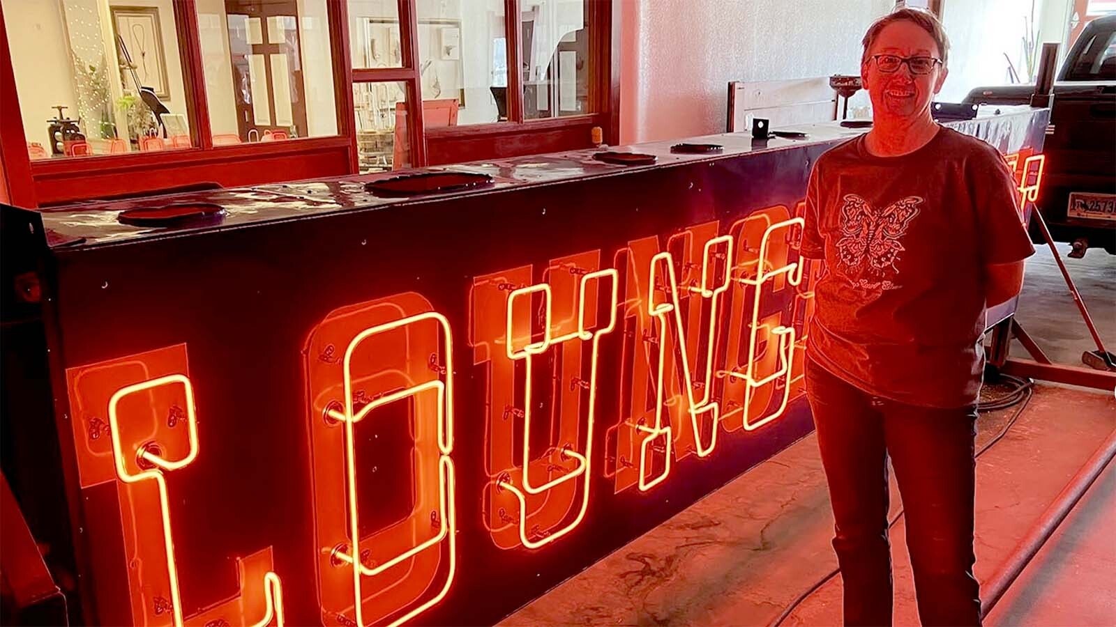 Casper neon artist Connie Morgan said she has about 70 % of the glass on the cowboy sign left to restore.