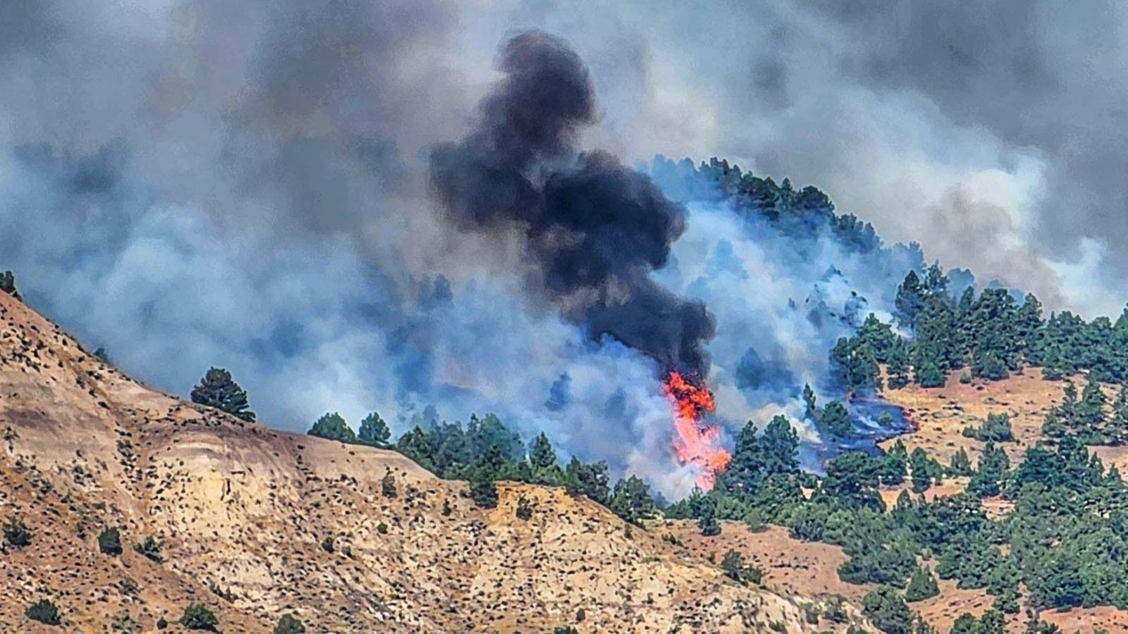 The Constitution Fire in Campbell County, like others in northern Wyoming, continues to grow and tax firefighting resources.