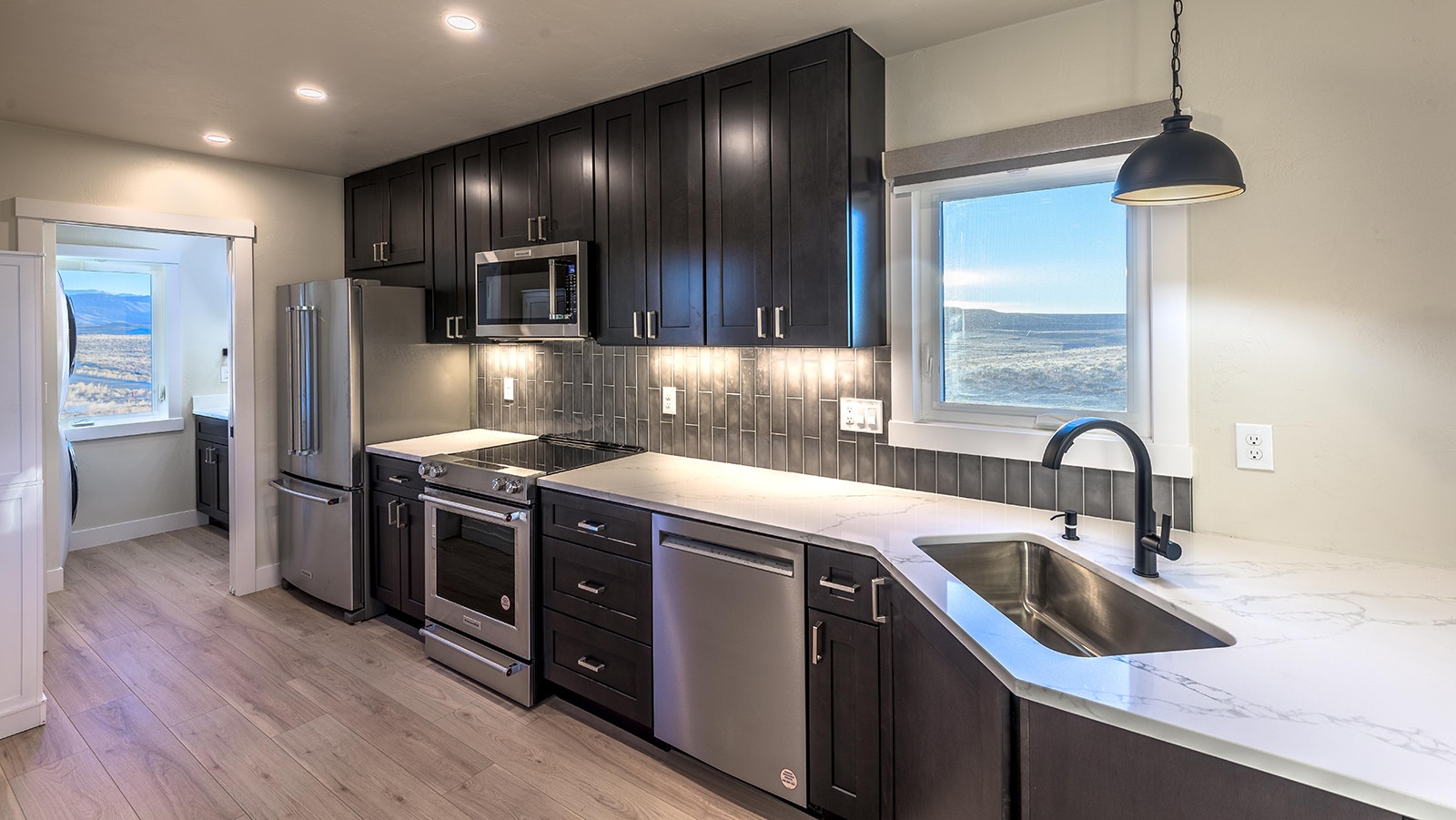 The kitchen in this demonstration home features top-level appliances and fixtures.
