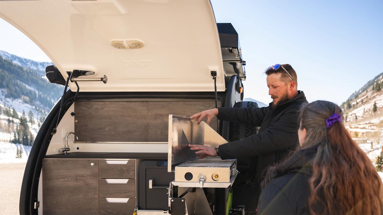 Mike and Mary Mitchell check out their new trailer which has everything needed for off-the-grid camping trip.