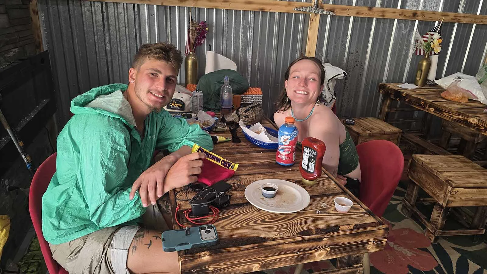 Willie Hammond and Haleigh Swabowicz are among Continental Divide hikers helping to boost small Wyoming towns all along the trail. Here they are eating snacks at On Site Laundromat in Lander.