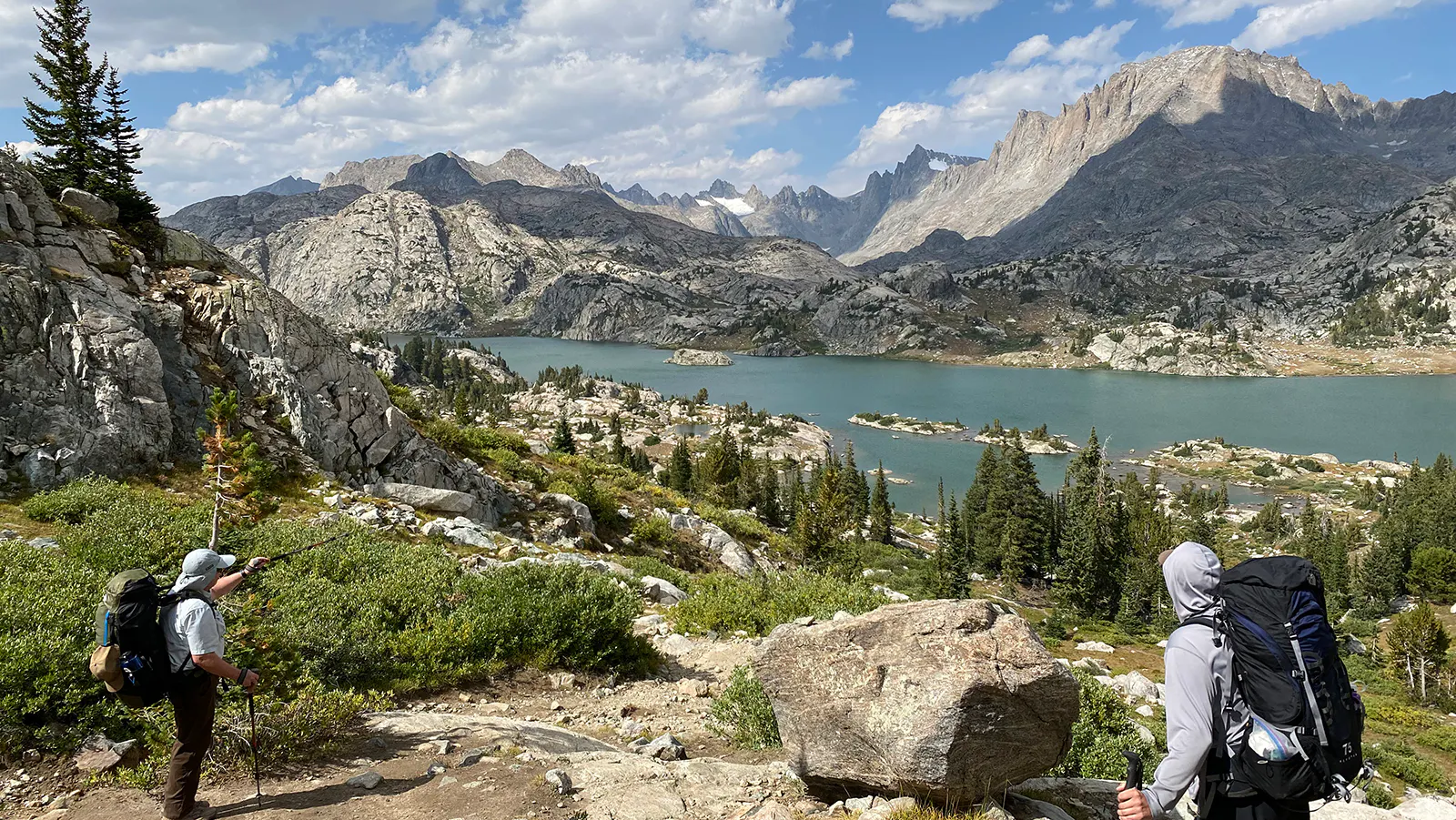 Continental Divide hikers near Island Lake in the Wind River Range of Wyoming.