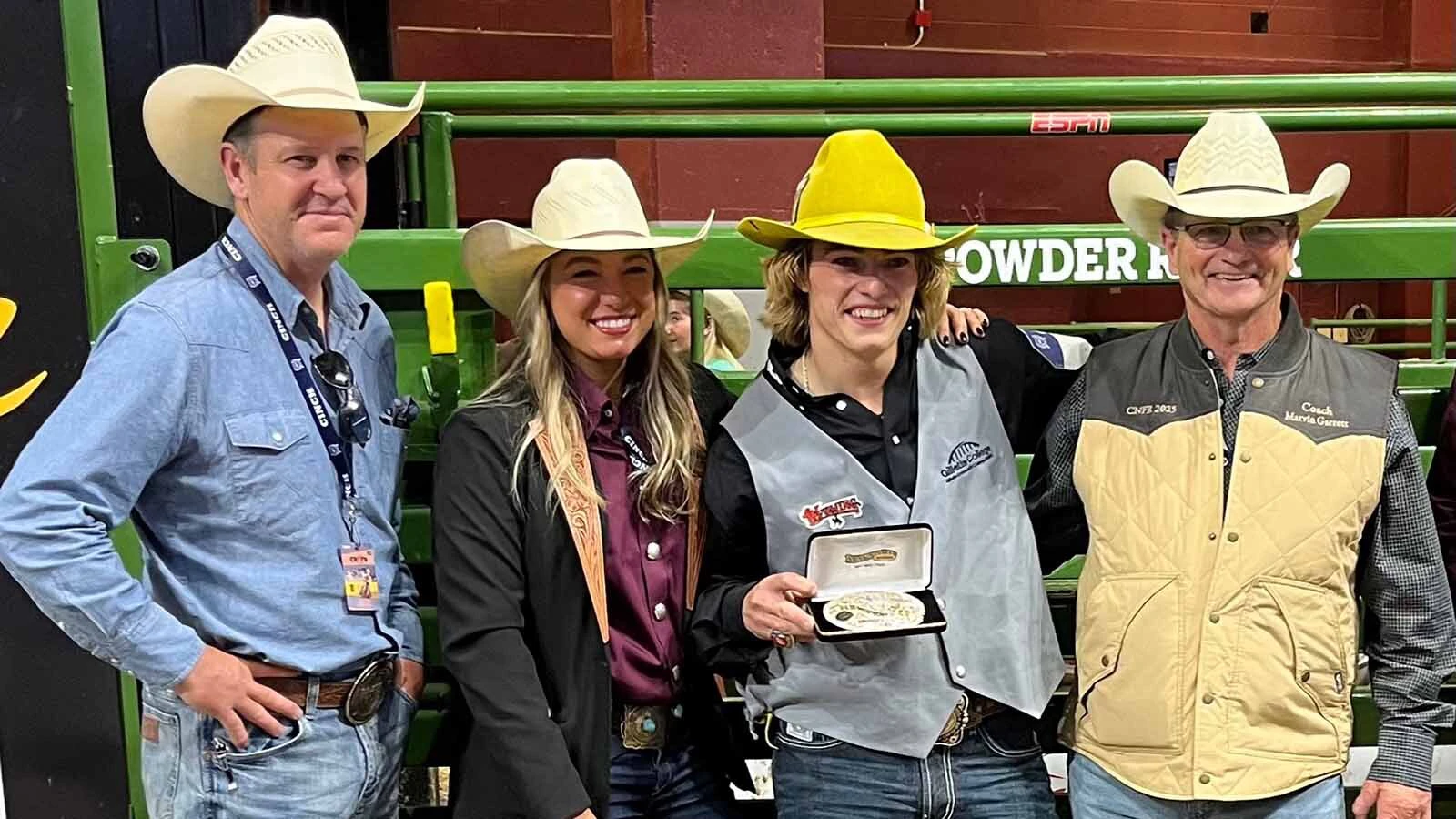 Cooper Filipek at the CNFR with Gillette College coaches Will La Duke and Casey Rae Sellers, aliong with Marvin Garrett.