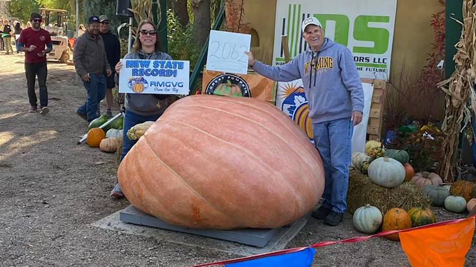 Amy and Andy Corbin with their Wyoming state record 2,062-pound pumpkin.