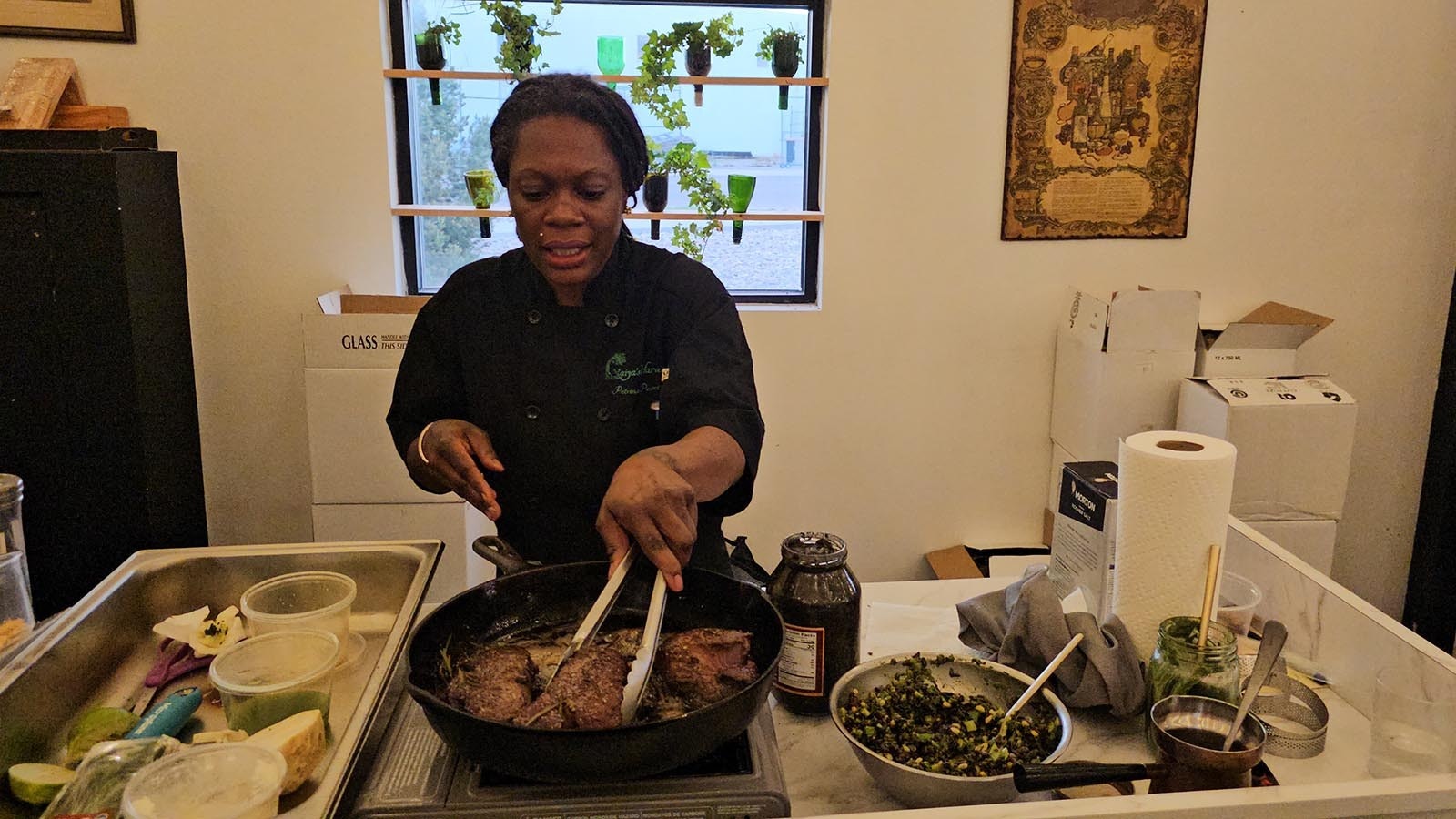 Chef Petrina Peart turns steaks in a pan of browned butter. These steaks were delicious and oh-so-tender.