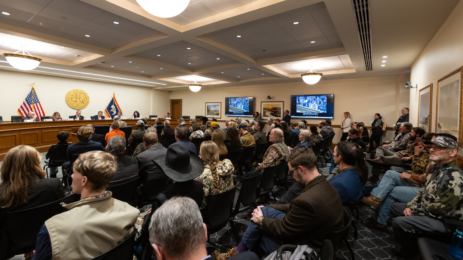 In a room packed with camouflage-clad hunters, a legislative committee voted Thursday to forward a bill that would officially make corner-crossing legal in Wyoming.