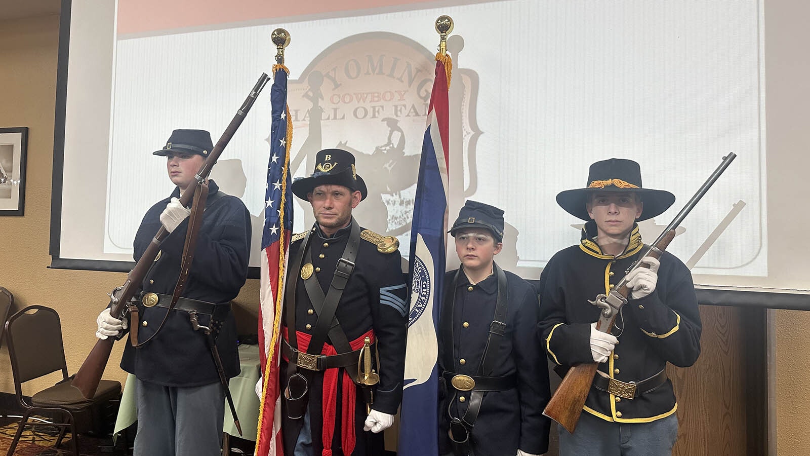 The Platte Bridge Company were invited as the honor guard for the Wyoming Cowboy Hall of Fame. They are, left from right, Boone Donley, Nic Skalicky, Derrick Chesser, and Clay DeWitt.