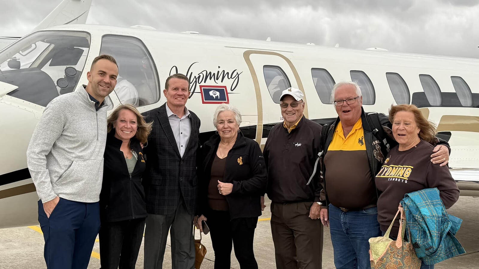 A group of Cowboy Joe Club donors took a trip in a state of Wyoming jet to watch a UW basketball game in Texas in November.