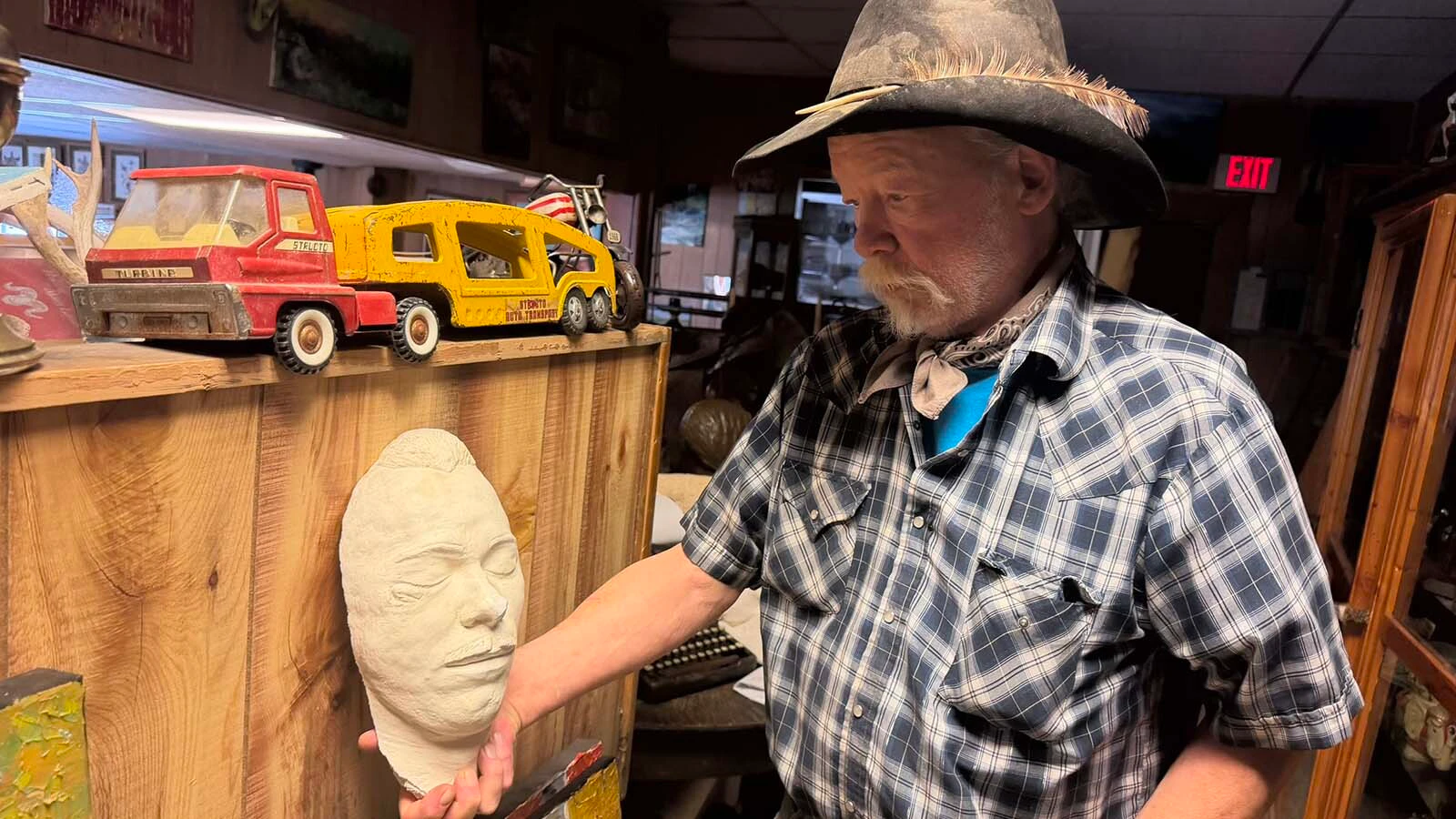 ohn Fremlin keeps his most valuable items in his antique store in his safe which includes the death mask and hand-carved gun of John Dillinger, a bank robber and murderer, who escaped from prison in the 1930s before being gunned down. Fremlin is constantly on the lookout for treasures such as this for his antique store in Meeteetse.