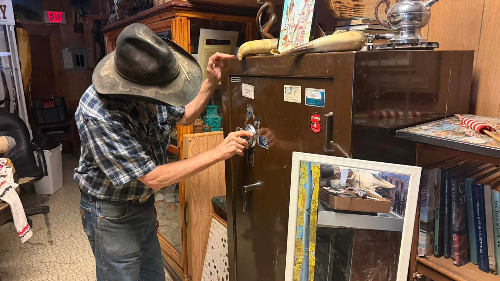 ohn Fremlin keeps his most valuable items in his antique store in his safe which includes the death mask and hand-carved gun of John Dillinger, a bank robber and murderer, who escaped from prison in the 1930s before being gunned down. Fremlin is constantly on the lookout for treasures such as this for his antique store in Meeteetse.